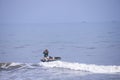 Da Nang, Vietnam, January 16, 2020, Vietnamese fisherman flying inside a round bamboo Royalty Free Stock Photo